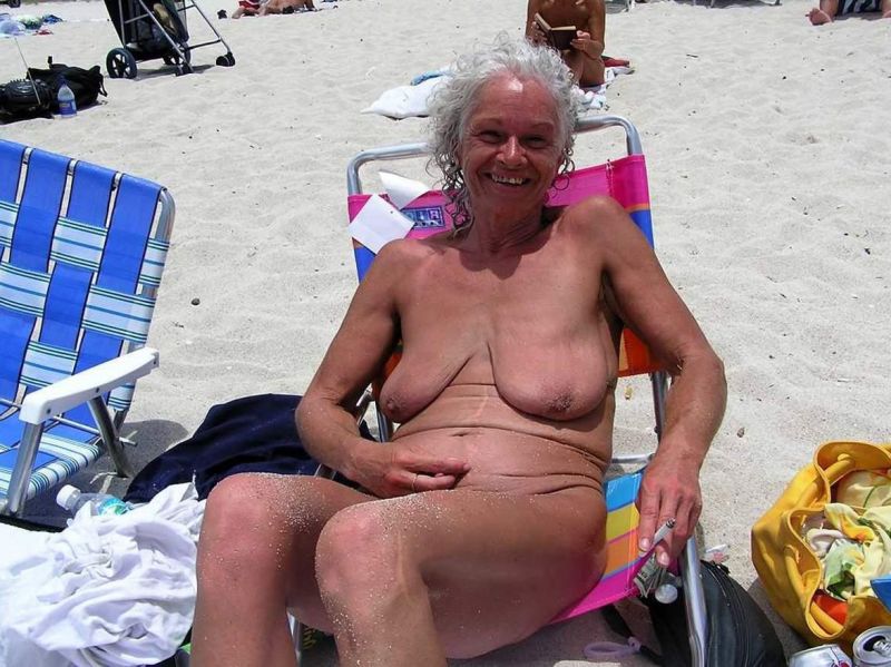 mature milf topless on beach