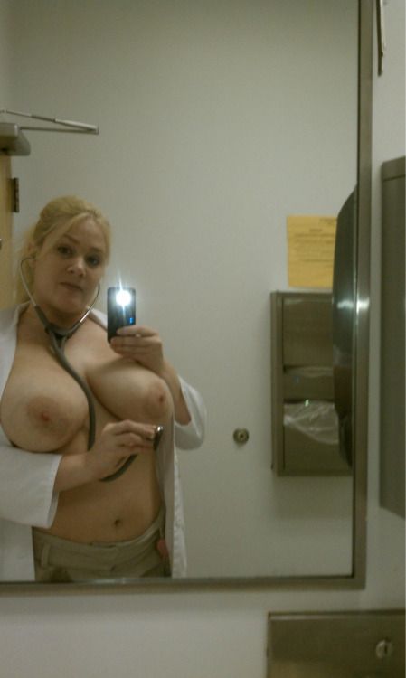 nurse in scrubs selfie