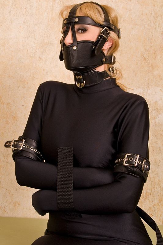 women tied and muzzled