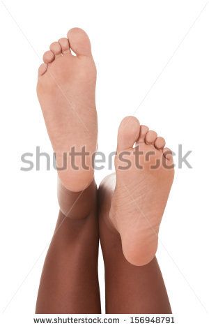 her feet soles in face