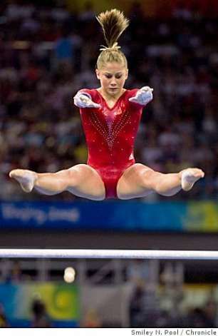 female gymnast rips outfit