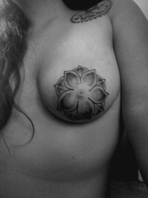 heart nipple tattoo