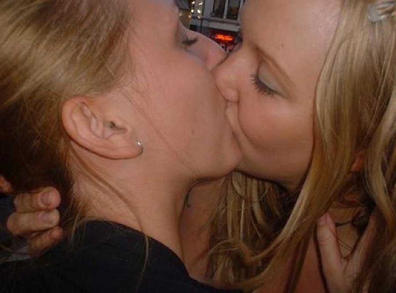 wife kissing girlfriend