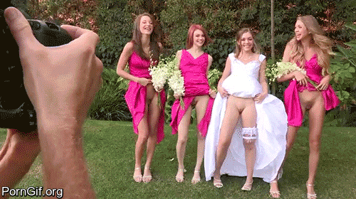 bridesmaids flashing at wedding