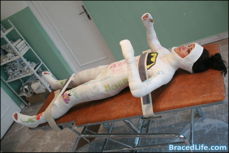 immobilized in a body cast