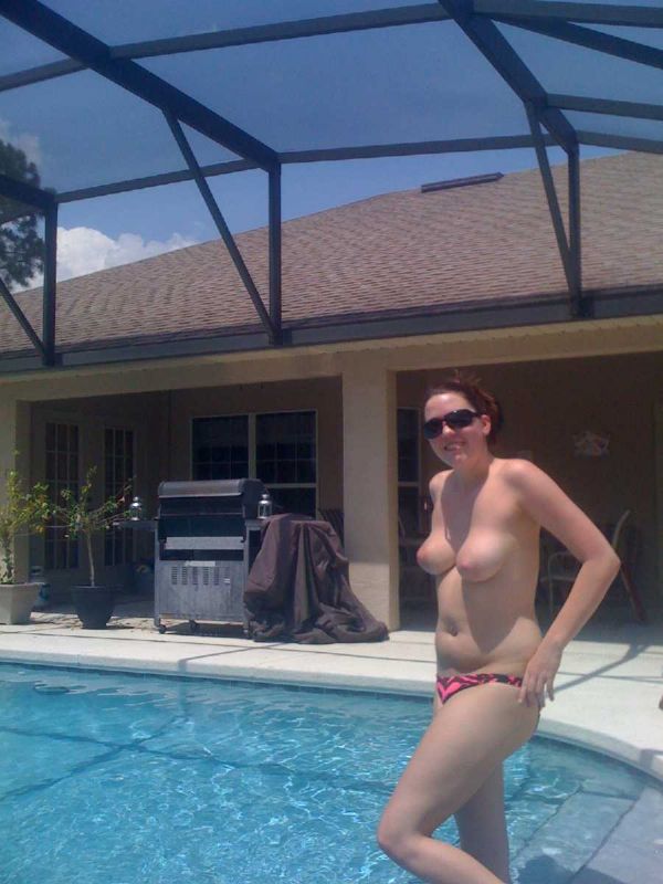 slut girlfriend swims in pool