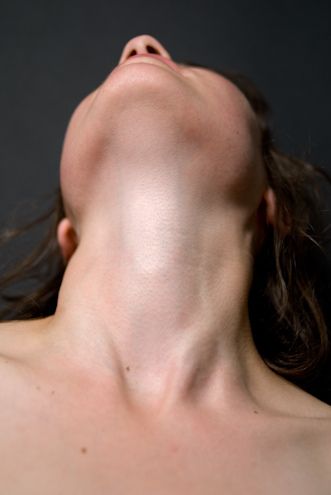women stretched necks and throats