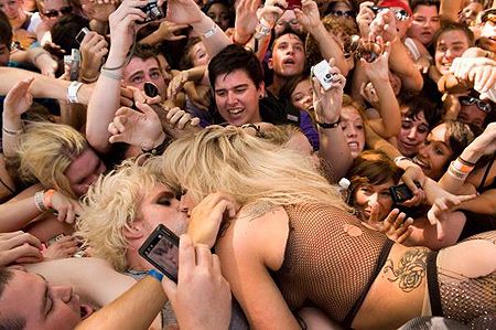 surfer girl naked in crowd