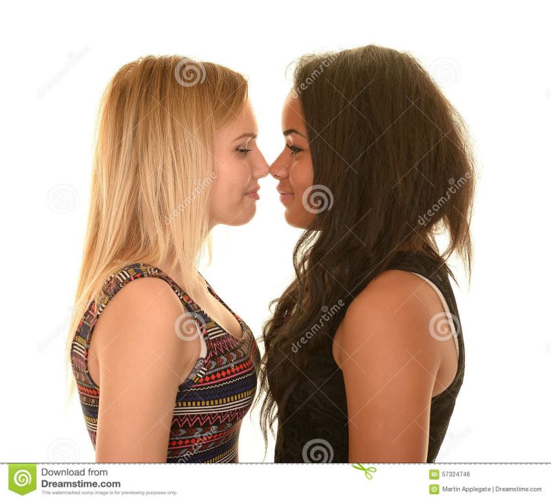 women standing nose to nose