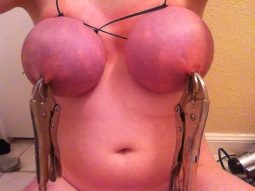 two girls nipples tied together