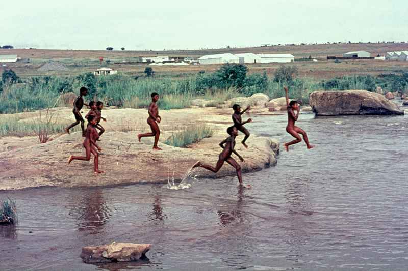 african girls bathing in river