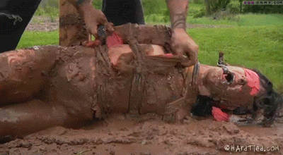 women stuck in mud
