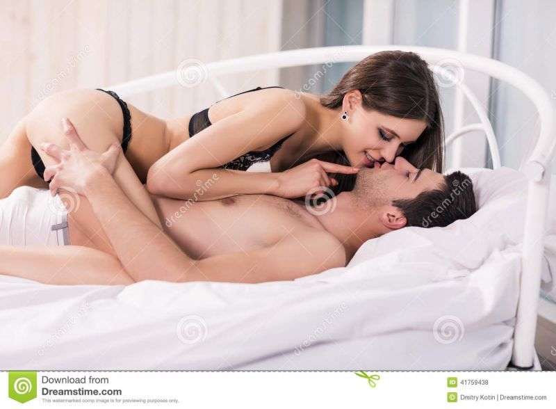 passionate couple sex in bed