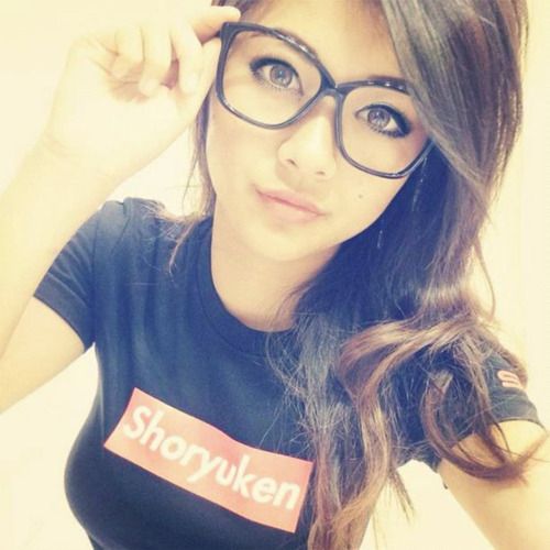 Nerdy beauty with glasses banging herself