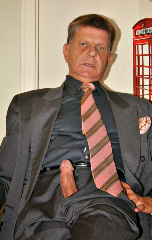 men in suits showing cock