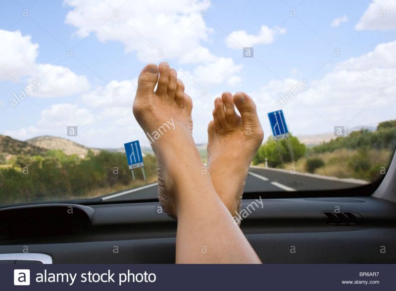milf upskirt feet on dashboard