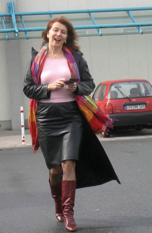 women in bondage wearing boots