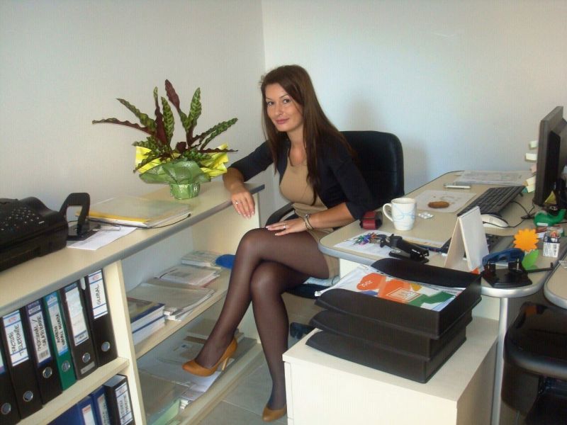 candid pantyhose feet in office