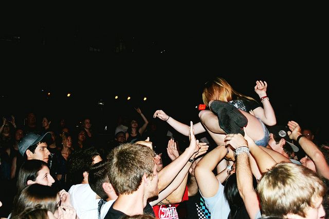 woman showing pussy crowd surfing