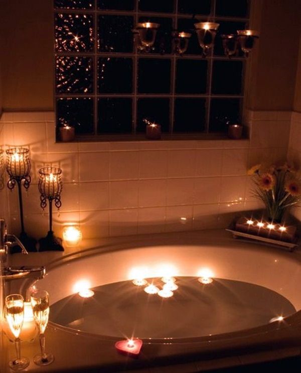 relaxing in bubble bath with candles