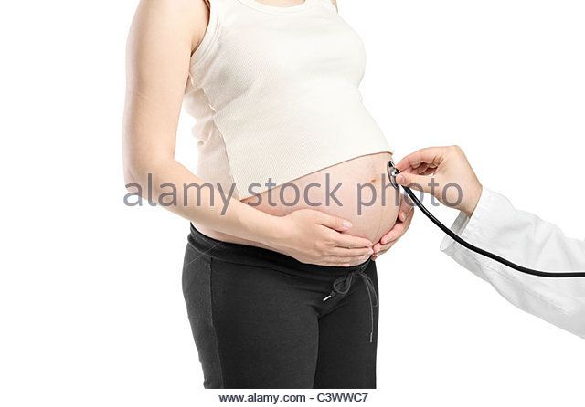 pregnant at doctors examination