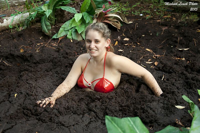 women sinking into quicksand