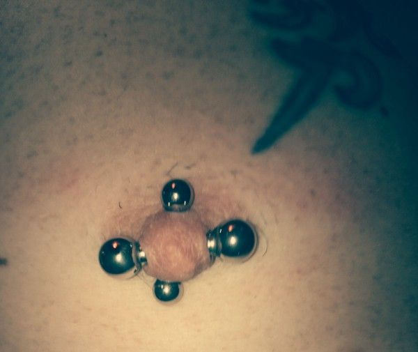 male nipple piercing