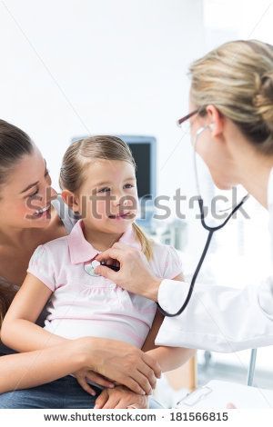 dad examining daughter chest