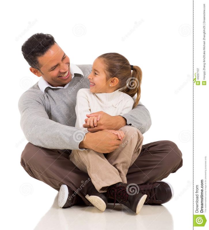 daughter sitting on daddys lap