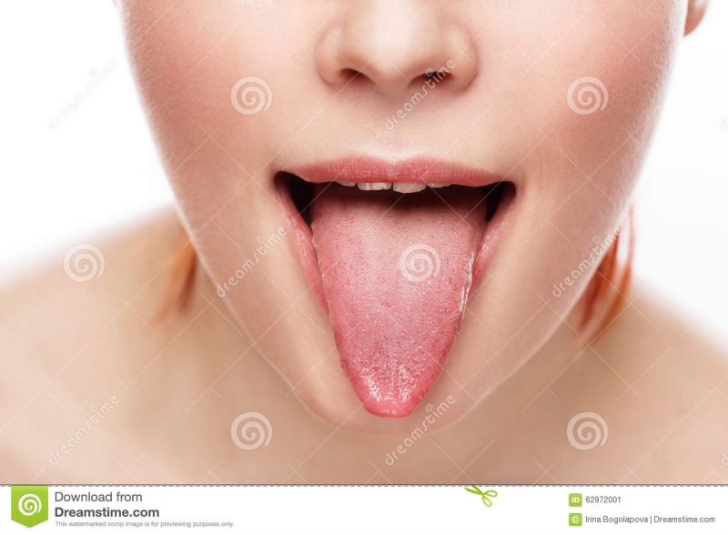 woman sticking tongue out teasing