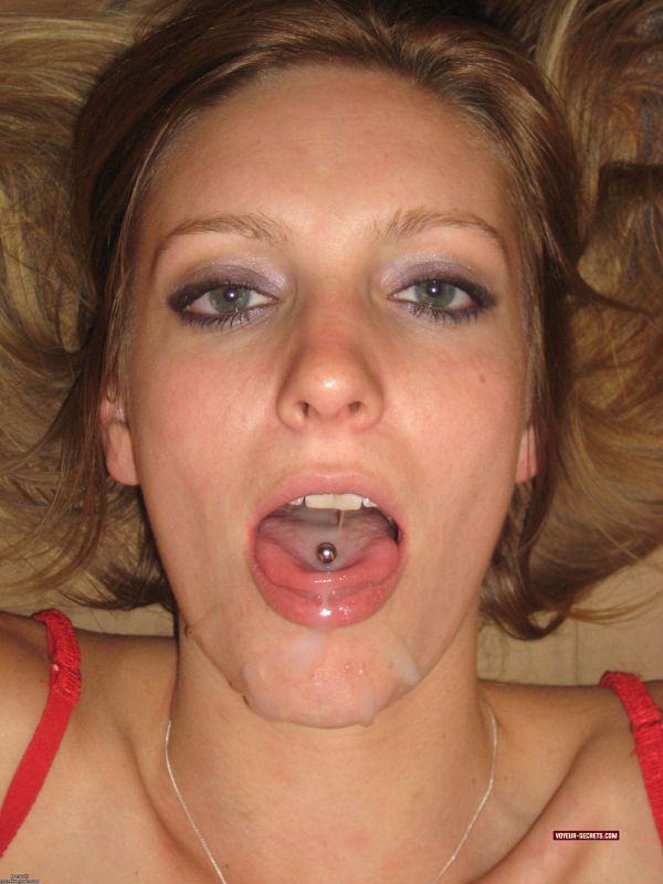 beautiful woman sticking tongue out
