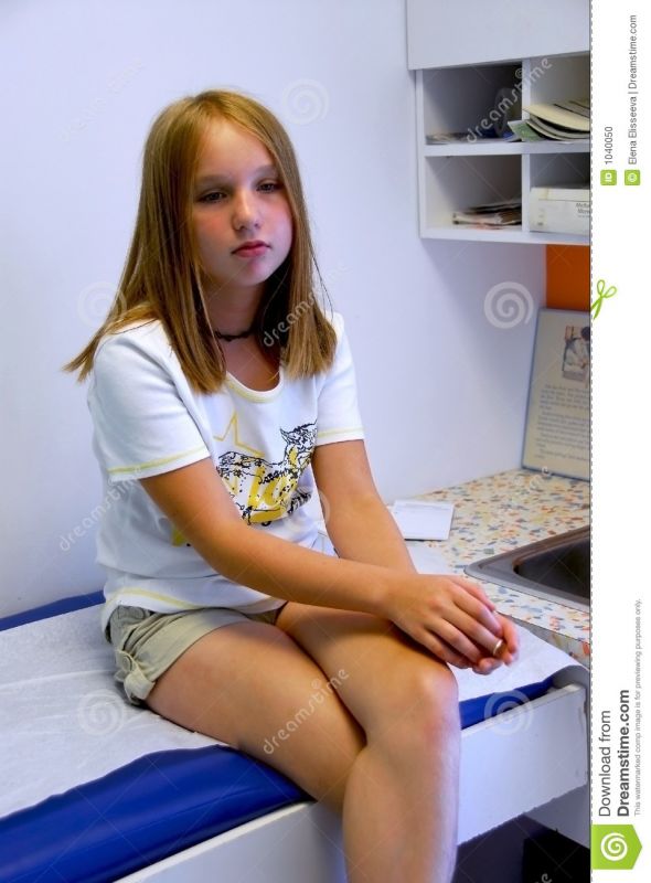 teenage doctor examining girl groin