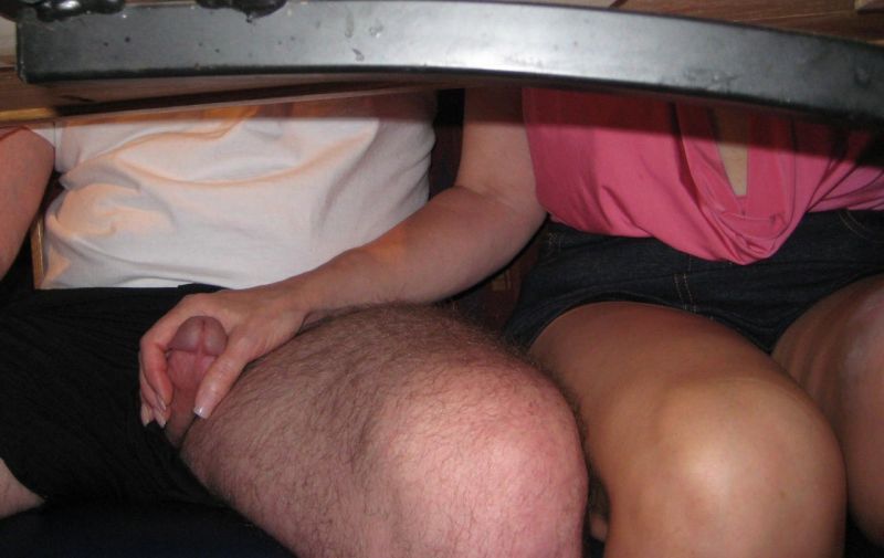 rubbing pussy under restaurant table of