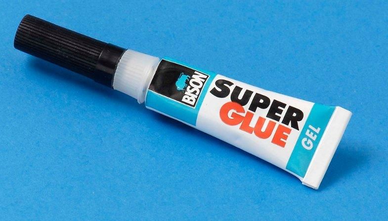 tucking genitals with super glue