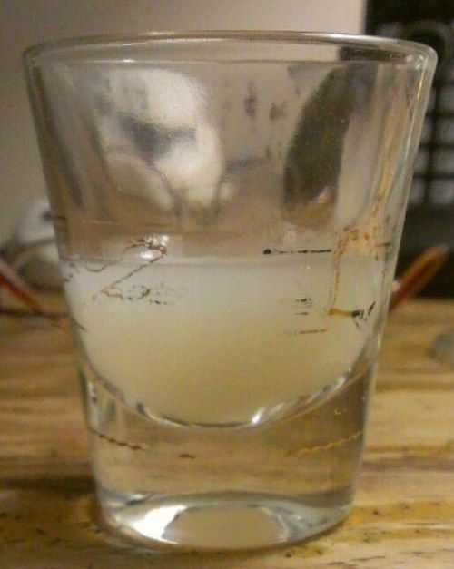 drinking cum from a glass