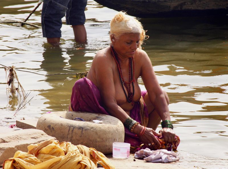 natural women bathing in river