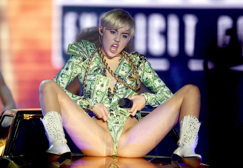 miley cyrus on stage doll blows