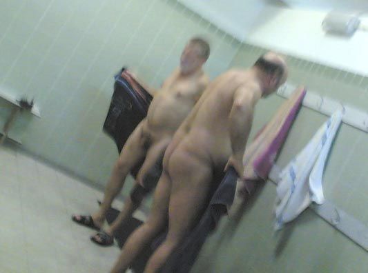 two men in gym showers