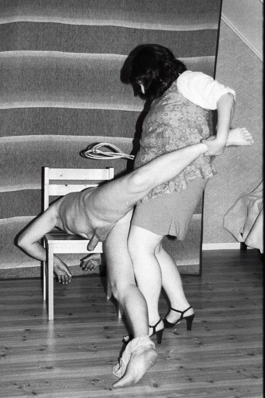 topless woman spanking man