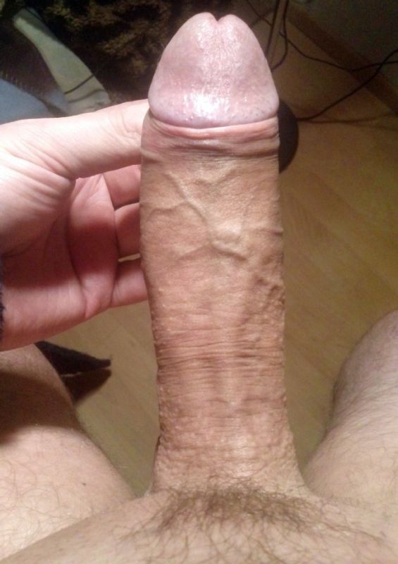 long uncut penis close up