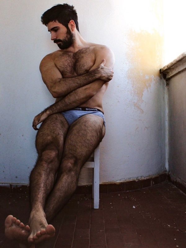 man with hairy legs