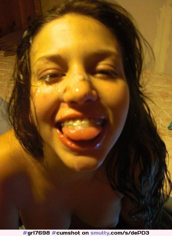 Latina pretty face covered with semen