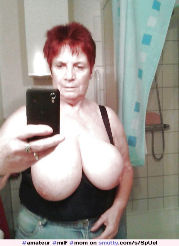 redhead big tits naked selfie