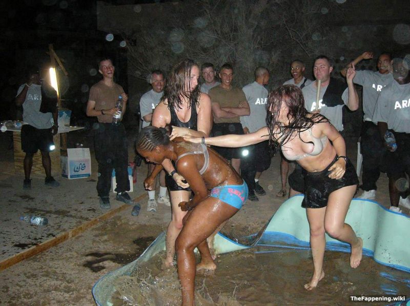 two nude women spanking men