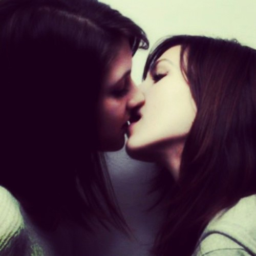 lesbian couple kissing romantic