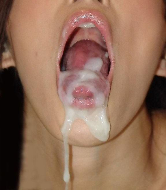 dripping cum on her tongue