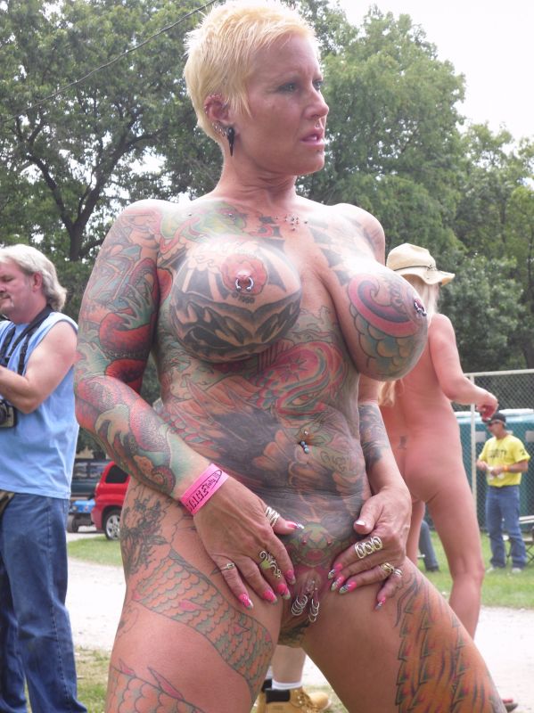 people covered in tattoos
