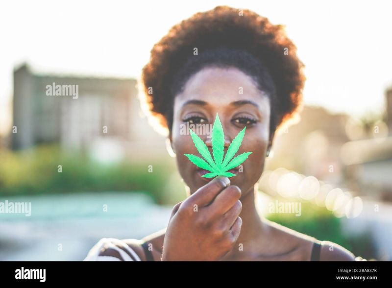 girl holding plant