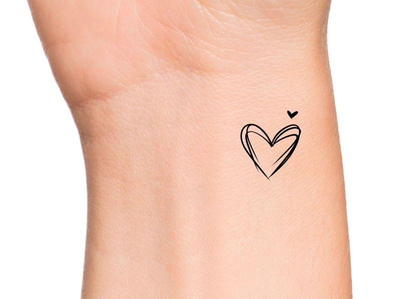 floral heart tattoo