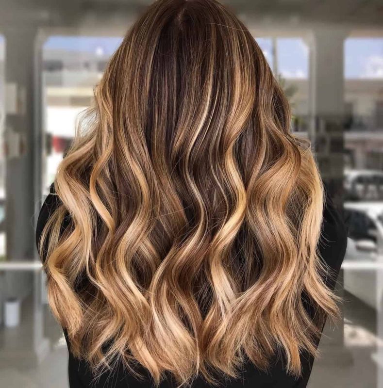 warm caramel blonde hair color